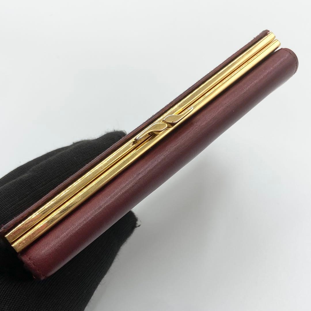 カルティエ　折り財布　がま口　ゴールド金具　マストライン　レザー　ボルドー